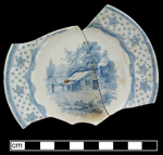 White earthenware printed underglaze cup plate.